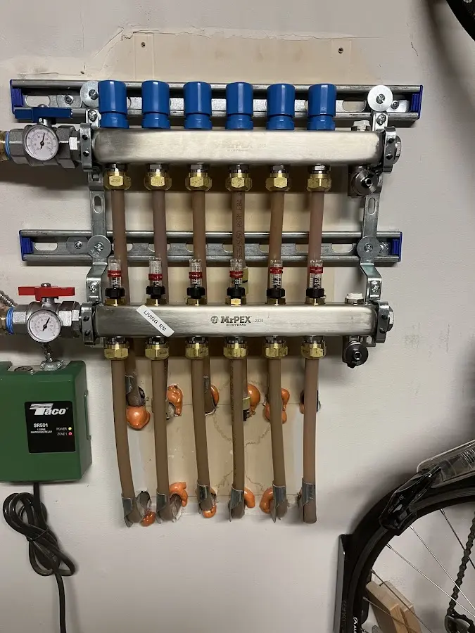 Plumber performing Water Heater Repair at a residential property in Prairie du Sac